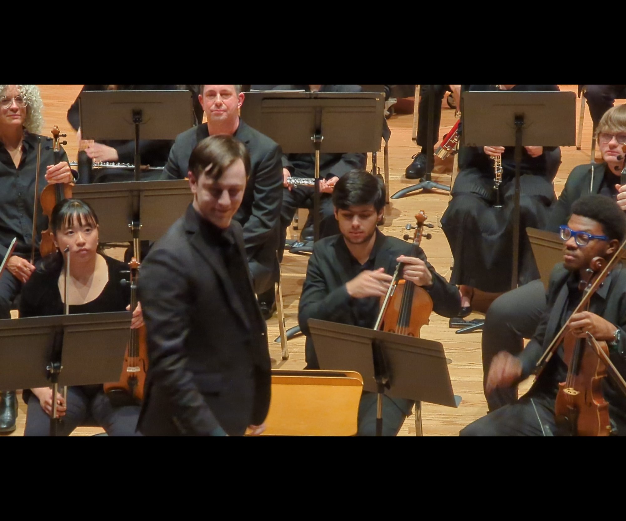Acknowledging the audience after a BWSO concert